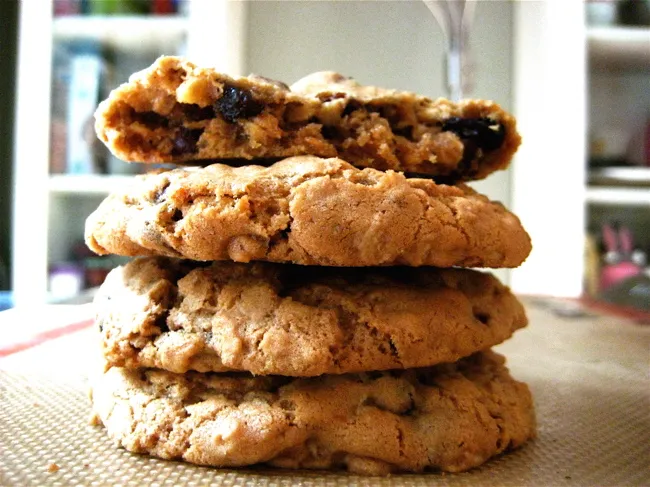 a stack of oatmeal chocolate cherry pecan cookies
